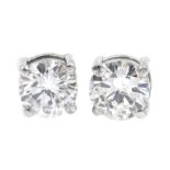 Pair of 18ct gold round brilliant cut diamond stud earrings, diamond total weight approx 1.