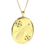 Heavy 18ct gold ruby, emerald and sapphire locket with engraved bird of paradise,