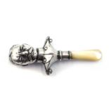 Novelty silver babies rattle modelled as Lord Kitchener,