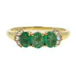 Iliana gold oval emerald and baguette diamond ring,