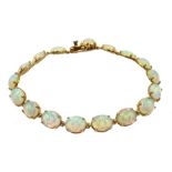 9ct oval opal link bracelet, stamped 375 Condition Report Length = 20cm,