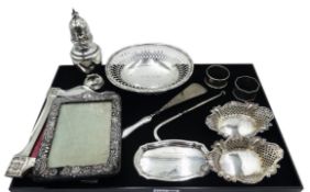Silver pierced silver dish by Barker Brothers, silver photograph frame by S W Smith & Co,