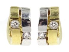 Pair of 9ct white and yellow gold hoop earrings set with two cubic zirconia's in each,