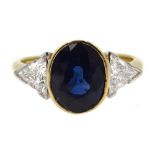 18ct gold oval sapphire and two trillion cut diamond ring, hallmarked, sapphire 2.