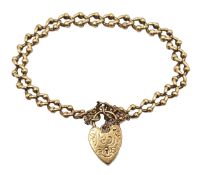 9ct gold cub link bracelet with heart locket, each link stamped 9.375, approx 15.