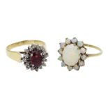 Gold opal cluster ring and a garnet and diamond cluster ring,