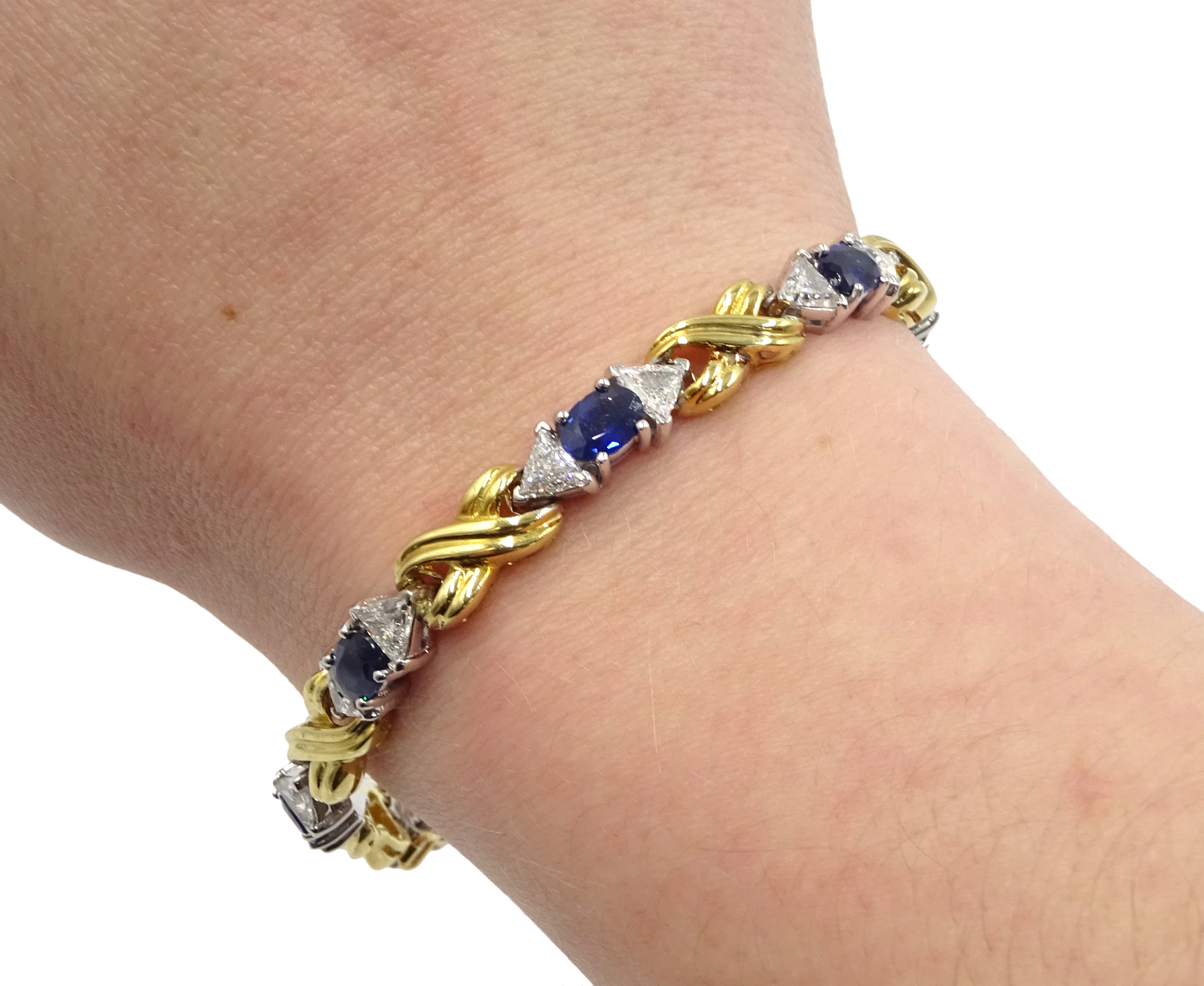 18ct gold eight oval cut sapphire and sixteen trillion cut diamond bracelet, - Image 5 of 7