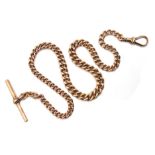 Early 20th century gold tapering Albert chain with T bar and clip, makers mark MD,