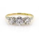 Gold three stone diamond ring stamped 18ct Plat, centre stone approx 0.