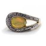 Silver oval opal and diamond contemporary design ring,