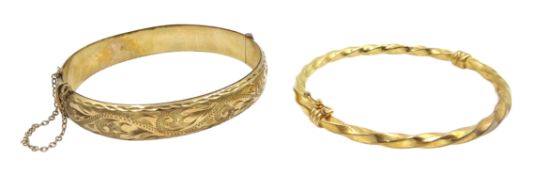 9ct gold hinged bangle with engraved decoration hallmarked a 9ct gold twist bangle stamped 375,