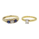 18ct gold baguette diamond solitaire ring and 9ct gold three stone diamond and sapphire ring,