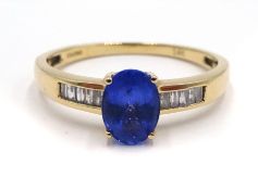 14ct gold oval tanzanite and baguette diamond ring,