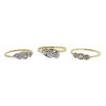 Three 18ct gold three stone diamond rings,