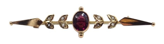 Gold garnet and seed pearl brooch stamped 9ct