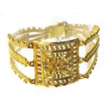 Asian 22ct gold filigree panel and three strand bracelet, stamped 22 KDM, approx 24.