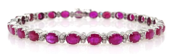 18ct white gold oval ruby and round brilliant cut diamond bracelet, stamped 750,