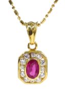 18ct gold oval ruby and diamond pendant necklace,