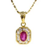 18ct gold oval ruby and diamond pendant necklace,