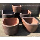 Two large 'D' shaped rustic frost proof pots (W51cm, H33cm, D61cm),