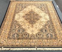 Keshan blue and gold ground rug, central medallion repeating border,