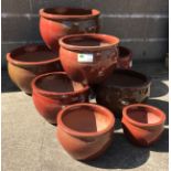 Set eight graduating glazed composite belly pot planters, D45cm,