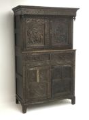 19th century heavily carved oak court cupboard, projecting cornice, blind fret frieze,