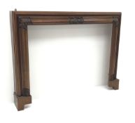 Early 20th century mahogany fire surround, moulded frame with foliage cared detailing, W145cm,
