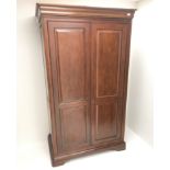 French cherry wood double wardrobe, projecting cornice,