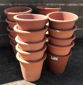Twenty circular tapering terracotta flower pots, D34cm,