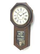 Ansonia wall clock with Roman dial and painted Guinness & Co's advertising glazed door,