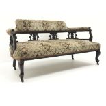 Late Victorian mahogany framed settee, upholstered back, arms and seat, pierced shaped splat,