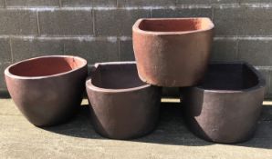 Three large 'D' shaped rustic frost proof pots (W51cm, H33cm, D61cm) and a similar bowl (D54cm,