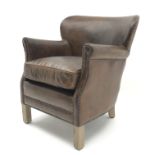 Club armchair upholstered in antique brown leather with low shaped back, W67cm, H74cm,