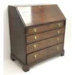 19th century oak bureau fall front enclosing fitted interior with four graduating drawers,