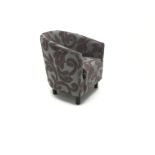 Tub shaped chair upholstered in purple and silver fabric,