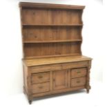 Victorian pine dresser, raised two tier plate rack above two frieze and four drawers,