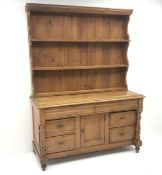 Victorian pine dresser, raised two tier plate rack above two frieze and four drawers,