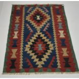 Old Turkish Kilim red and green ground rug,