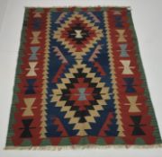 Old Turkish Kilim red and green ground rug,