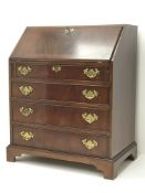 Georgian style mahogany bureau, fall front enclosing fitted interior, four drawers,