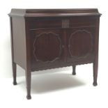 Gilbert's mahogany cased gramophone, hinged lid enclosing record table above two doors,