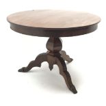 Victorian mahogany circular dining table, hexagonal baluster column, three shaped supports, D110cm,