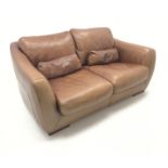 Two seat sofa upholstered in tan leather (W180cm) and matching armchair (W92cm) (2)