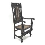 Carolean style oak chair, heavily carved back depicting mermaids, cane work splat and seat,