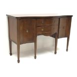 Regency style mahogany serpentine sideboard, two cupboards flanking two drawers, W138cm, H88cm,