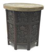 Easter style carved hexagonal table and a brass top table,