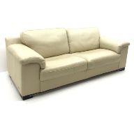 Violino three seat sofa upholstered in cream leather,