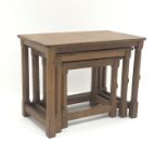 'Mouseman' oak rectangular nest, adazed top, octagonal supports, by Robert Thompson of Kilburn,