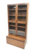 Mid century teak bookcase on cupboard,